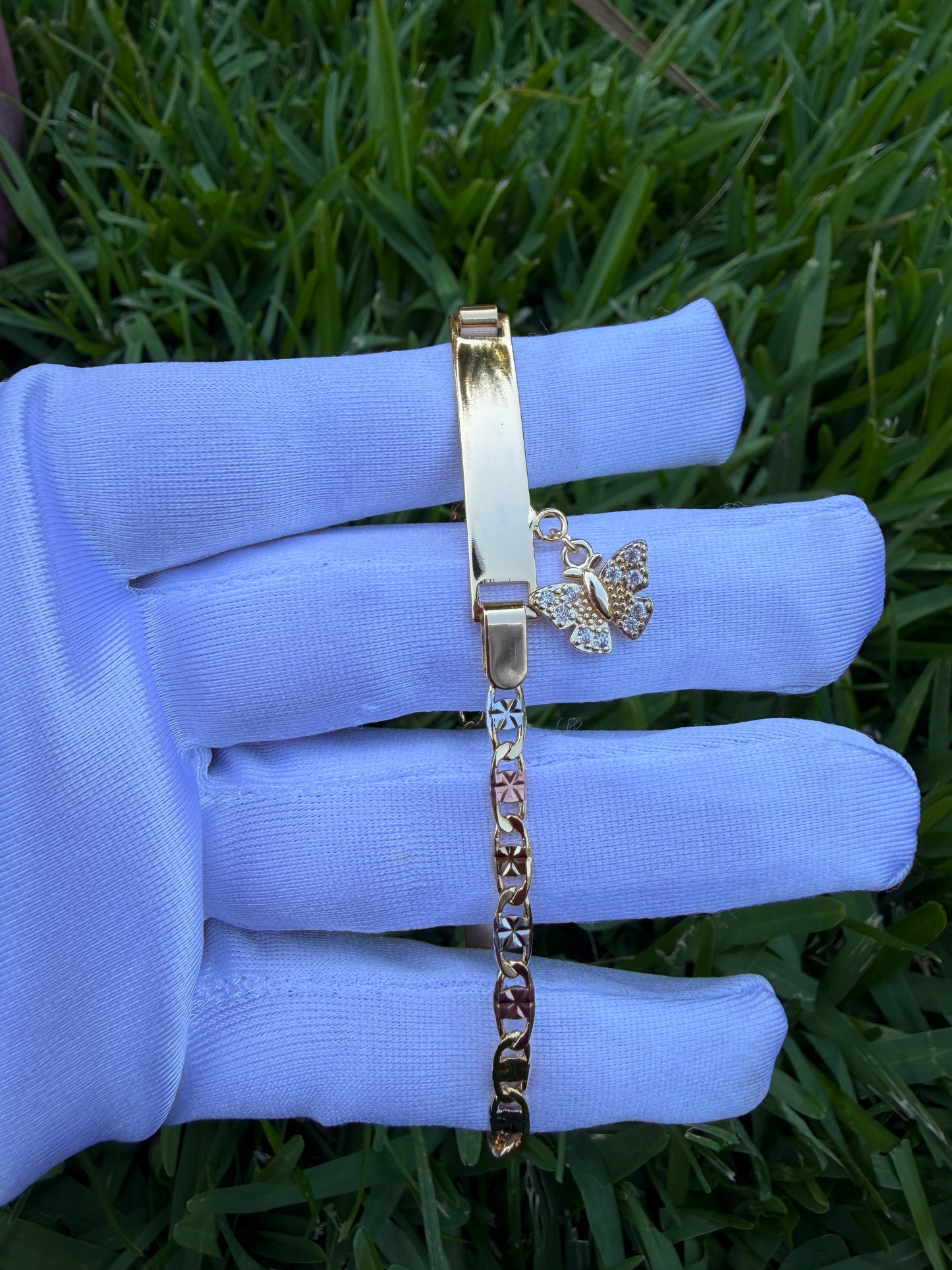 Elegant Elephant, Star, and Butterfly Charms on Gold-Tone Bracelet 7.5 inches