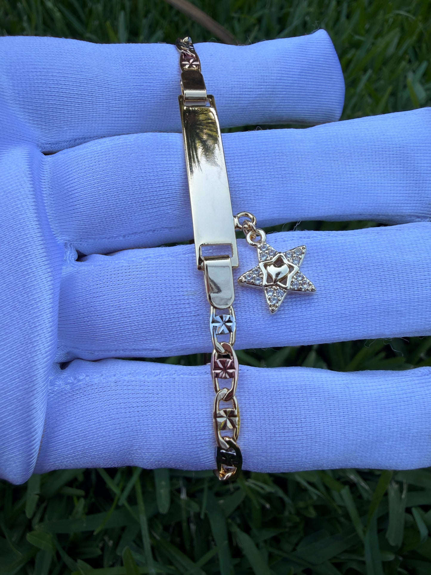 Elegant Elephant, Star, and Butterfly Charms on Gold-Tone Bracelet 7.5 inches