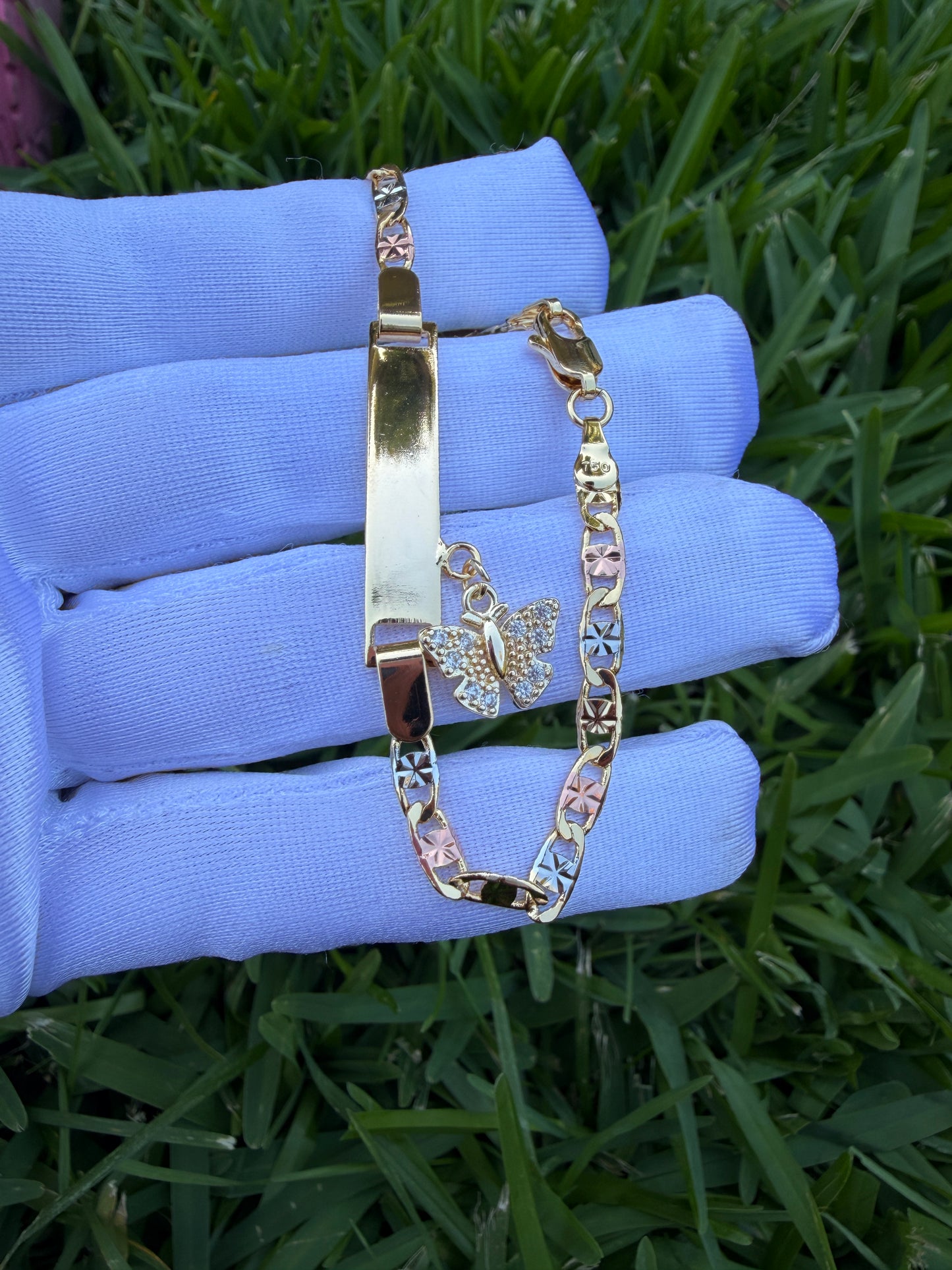 Elegant Elephant, Star, and Butterfly Charms on Gold-Tone Bracelet 7.5 inches