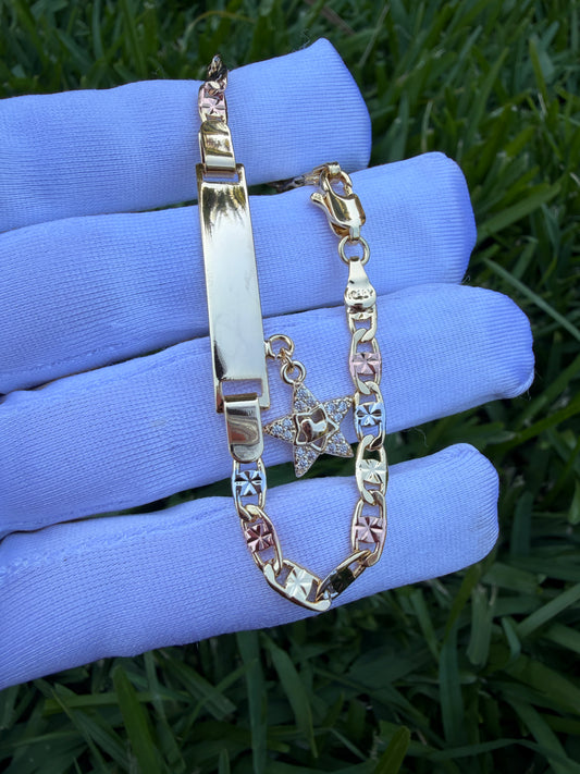 Elegant Elephant, Star, and Butterfly Charms on Gold-Tone Bracelet 7.5 inches
